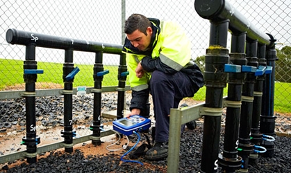 EPA officer taking measurements.